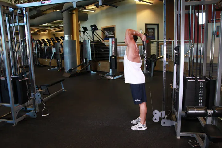 Cable Rope Overhead Triceps Extension — Start position