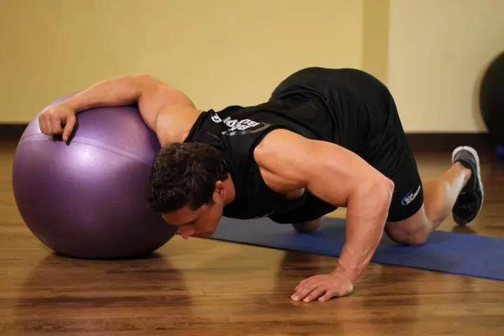 Chest Stretch on Stability Ball — Start position