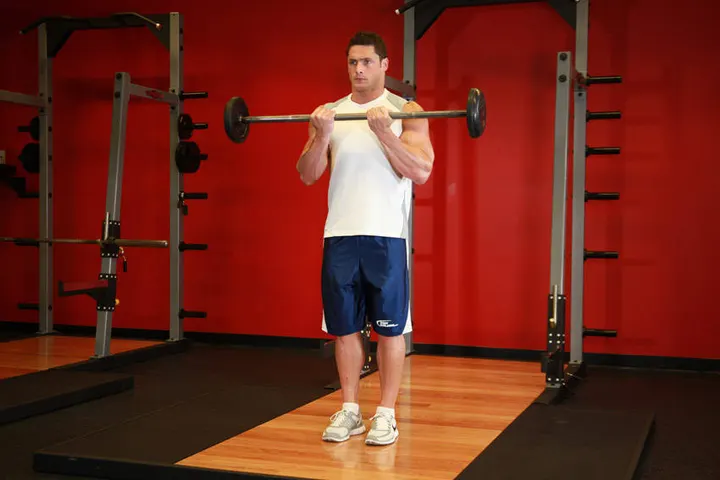 Close-Grip Standing Barbell Curl — End position