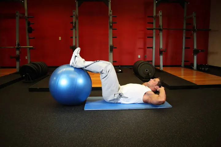Crunch - Legs On Exercise Ball — Start position