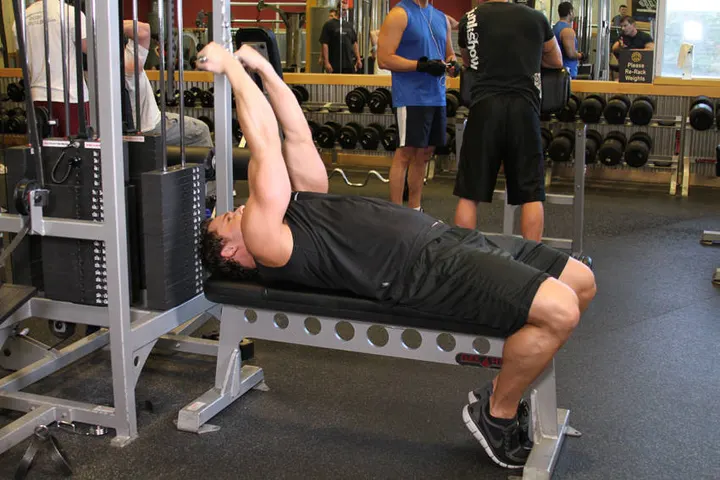 High Cable Curls — Start position