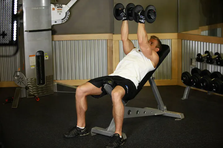 Incline Dumbbell Flyes - With A Twist — End position