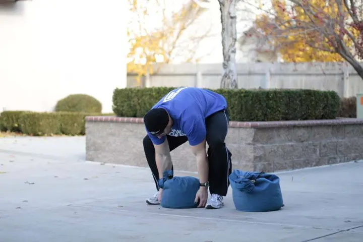 Sandbag Load — Start position