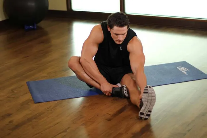 Seated Floor Hamstring Stretch — Start position