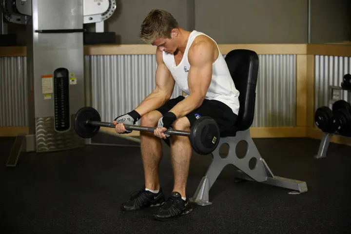 Seated Palm-Up Barbell Wrist Curl — Start position