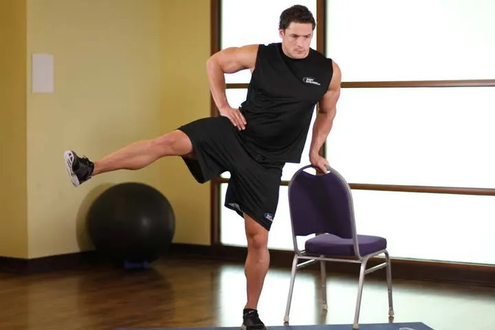 Side Leg Raises — End position