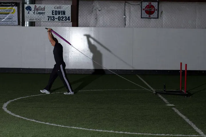 Sled Overhead Triceps Extension — End position