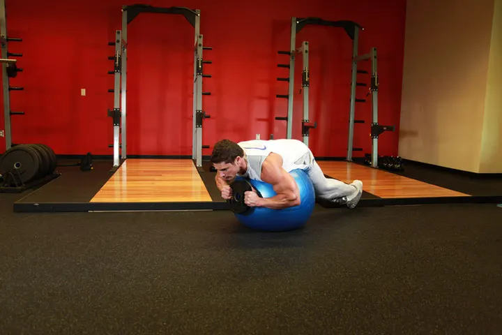 Weighted Ball Hyperextension — Start position