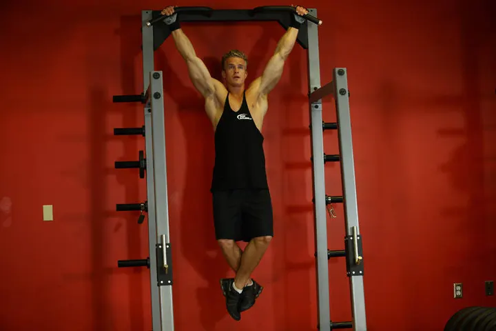 Wide-Grip Rear Pull-Up — Start position